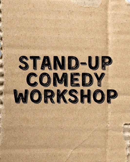 Torn cardboard sign reading Stand-Up Comedy Workshop